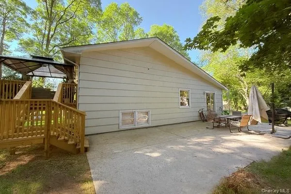 a view of a house with a patio
