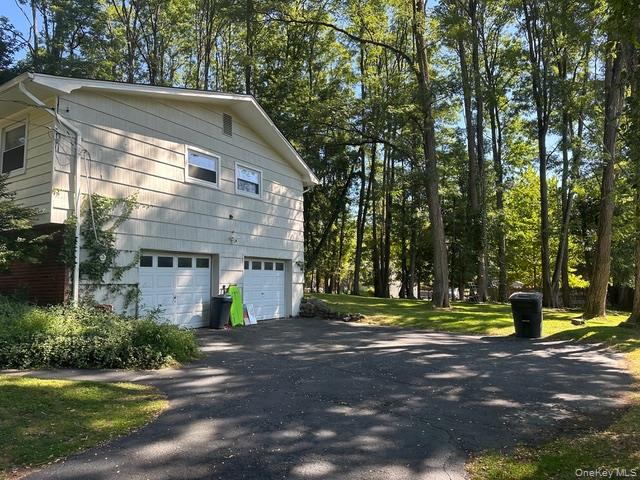 6 Adele Boulevard Spring Valley, NY 10977 - Photo 16 of 16 a front view of a house with a yard