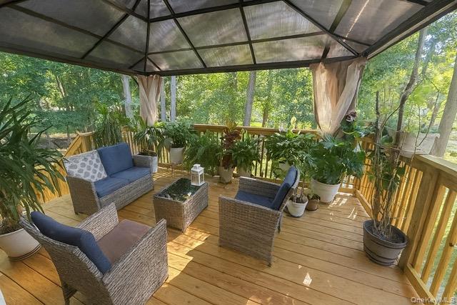 6 Adele Boulevard Spring Valley, NY 10977 - Photo 5 of 16 a outdoor living space with furniture and garden view