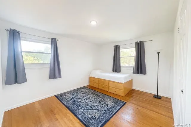 a living room with a rug