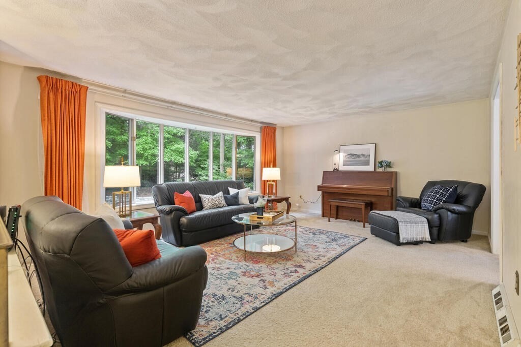 15 1/2 Algonquin Road Canton, MA 02021 - Photo 2 of 37 a living room with furniture and a large window