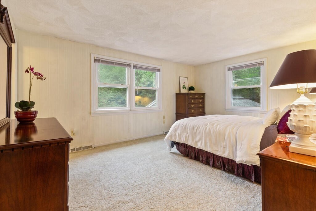 15 1/2 Algonquin Road Canton, MA 02021 - Photo 22 of 37 a bedroom with a bed and a window