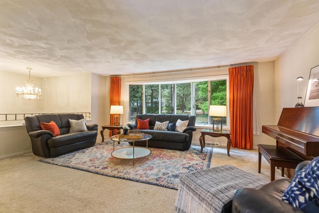 15 1/2 Algonquin Road Canton, MA 02021 - Photo 3 of 37 a living room with furniture and a large window