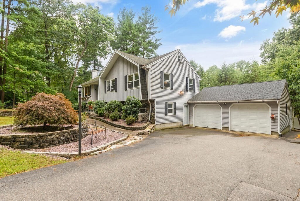 15 1/2 Algonquin Road Canton, MA 02021 - Photo 34 of 37 a view of a house with a patio and a yard