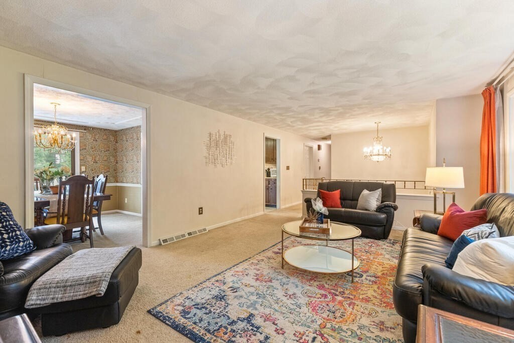 15 1/2 Algonquin Road Canton, MA 02021 - Photo 4 of 37 a living room with furniture and a wooden floor