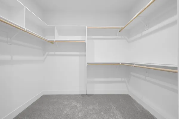 a view of an empty walk in closet