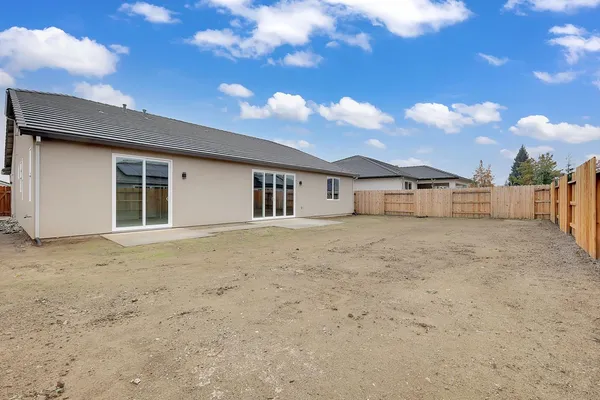 a view of backyard of house