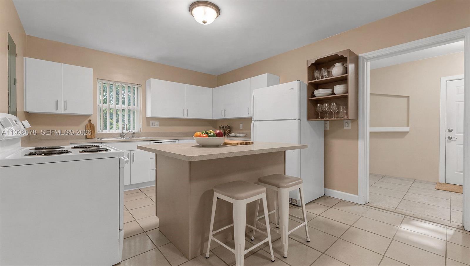 2231 Northwest 74th Street Miami, FL 33147 - Photo 7 of 21 Staged Kitchen