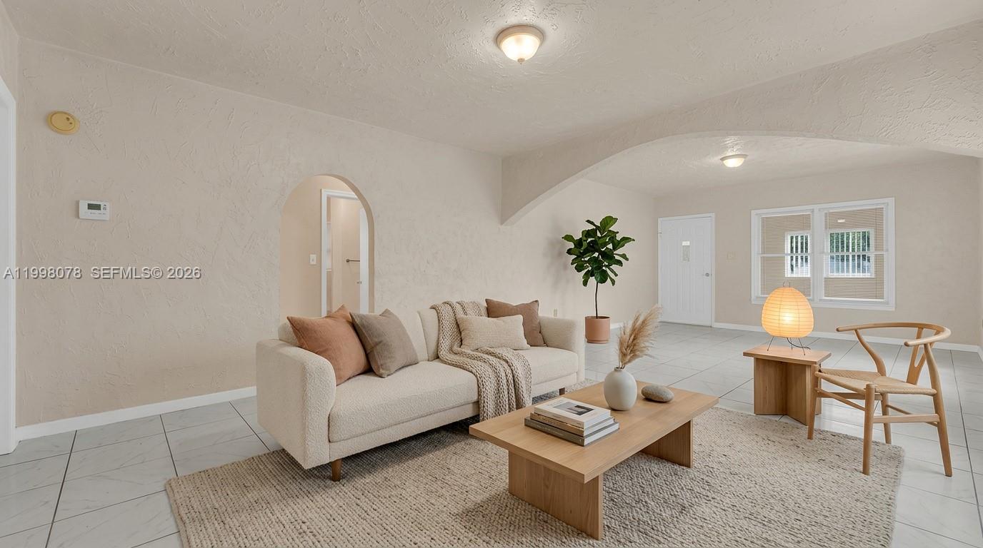 2231 Northwest 74th Street Miami, FL 33147 - Photo 10 of 21 Staged Living Room