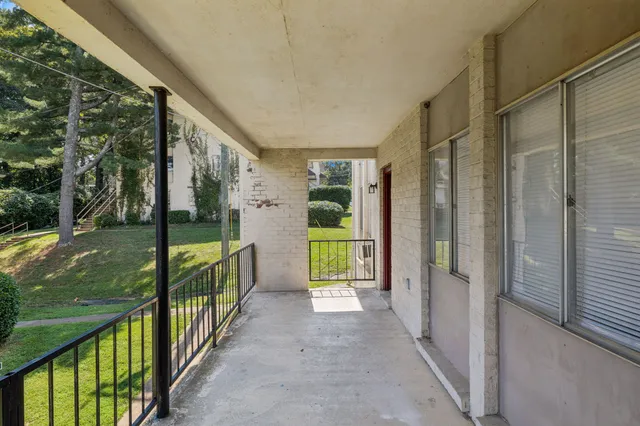 a view of porch with garden
