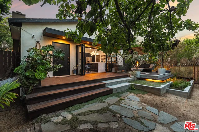 a garden view with a sitting space