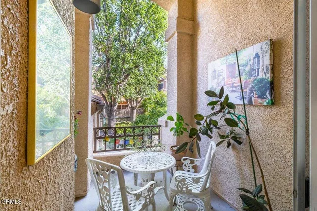 a outdoor dining space with furniture