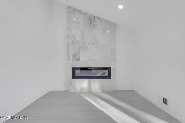 a view of an empty room and a gallery