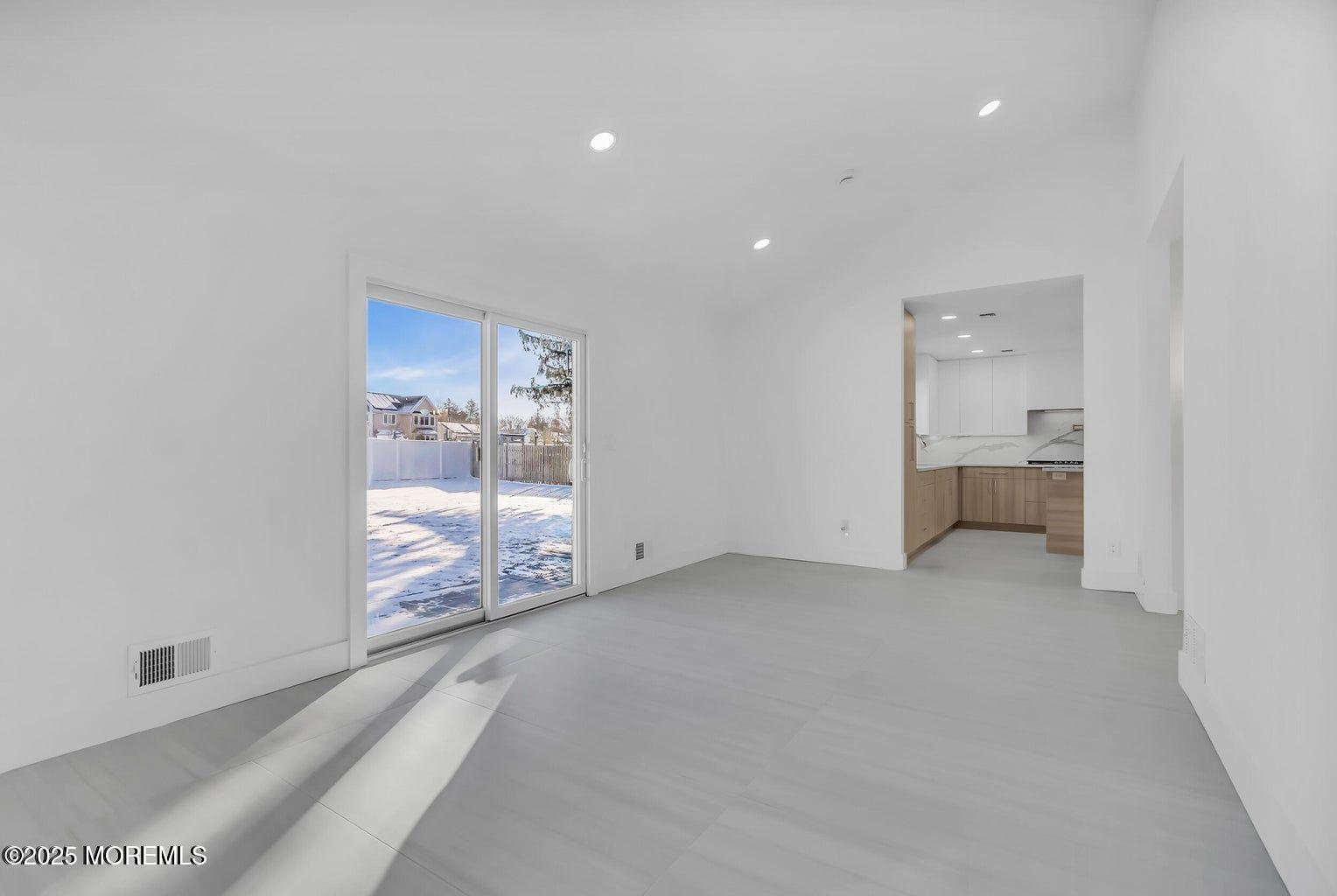 1 Robin Drive Oakhurst, NJ 07755 - Photo 16 of 42 a view of an empty room and a gallery