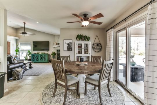 1214 North Guam Street Ridgecrest, CA 93555 - Photo 15 of 48 a view of a dining room with furniture window and wooden floor