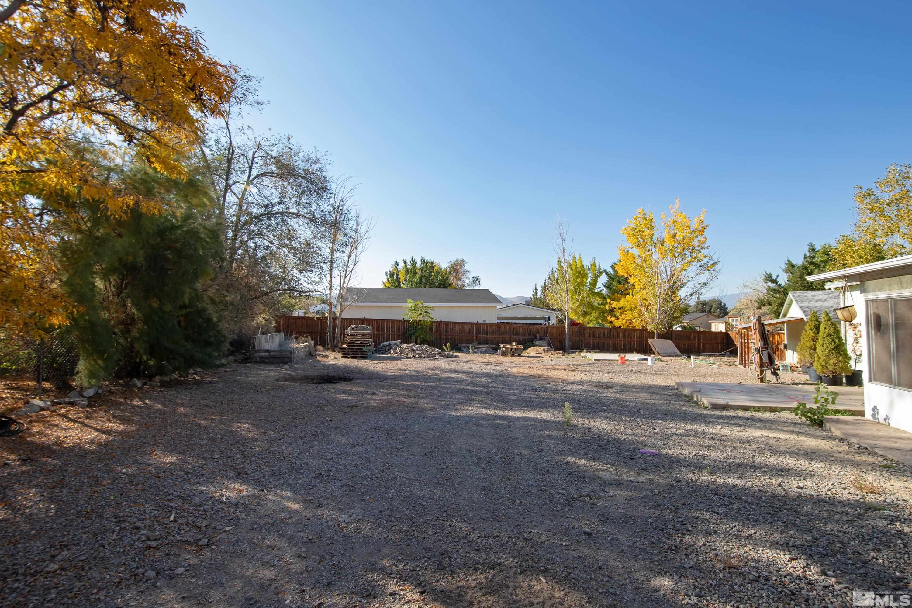 1536 King Lane Reno, NV 89521 - Photo 24 of 31 a group of cars parked in front of a house