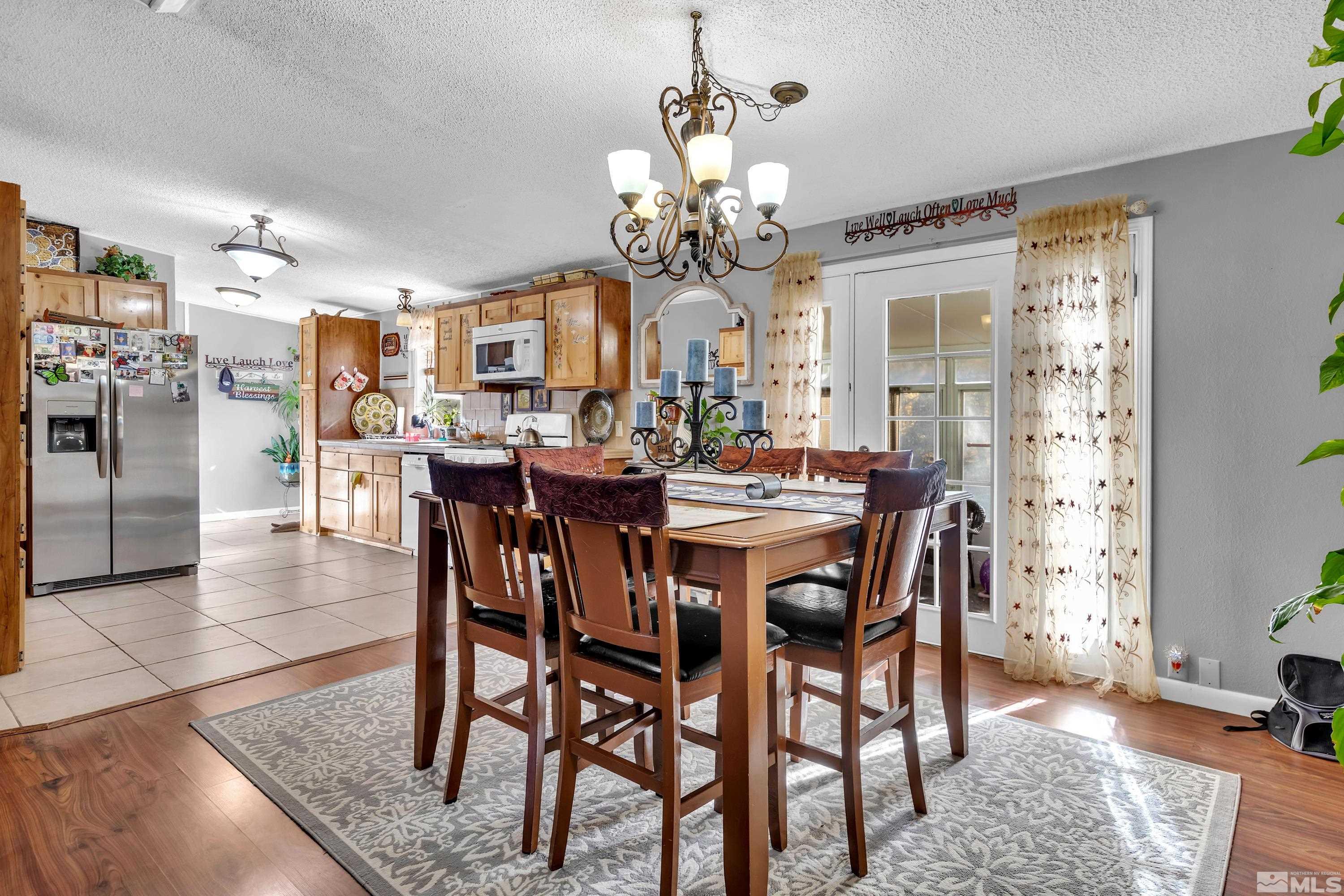 1536 King Lane Reno, NV 89521 - Photo 9 of 31 a view of a dining room with furniture