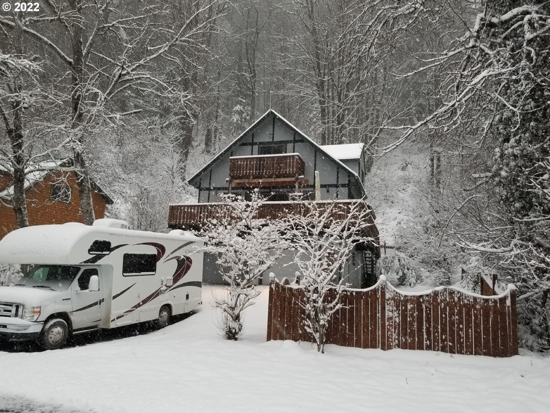 21545 Hideway Lane Rhododendron, OR 97049 - Photo 1 of 6 a car parked in front of house