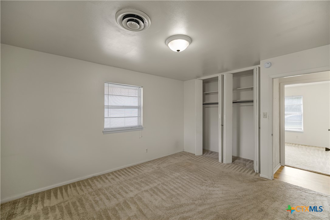 3104 Erwin Avenue Victoria, TX 77901 - Photo 11 of 19 an empty room with a empty space and windows