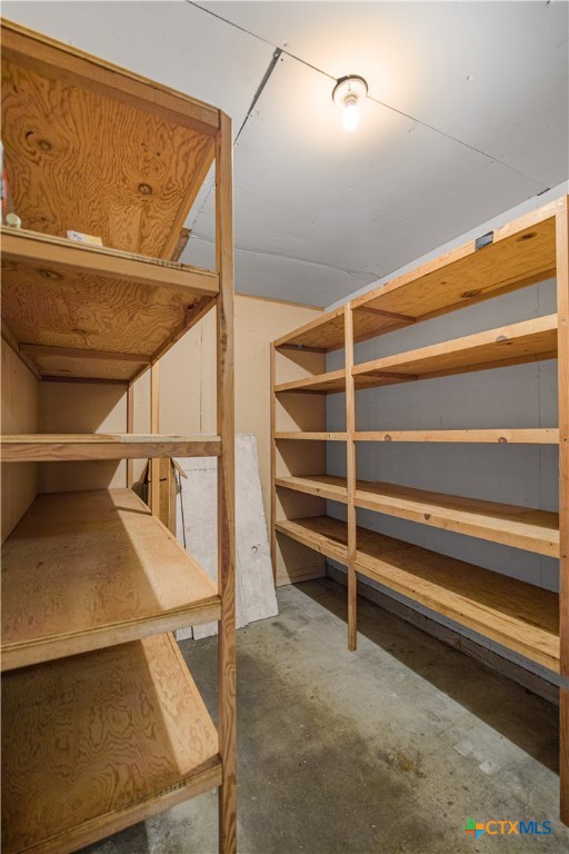 3104 Erwin Avenue Victoria, TX 77901 - Photo 14 of 19 a view of walk in closet with empty racks