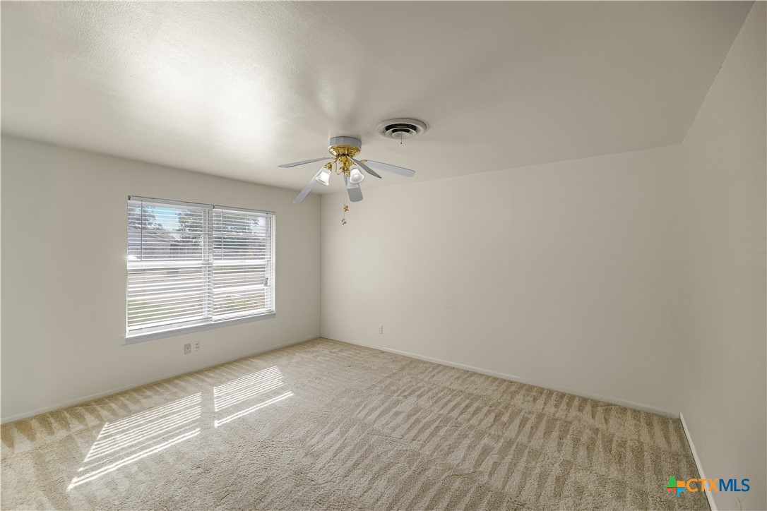 3104 Erwin Avenue Victoria, TX 77901 - Photo 3 of 19 an empty room with a window
