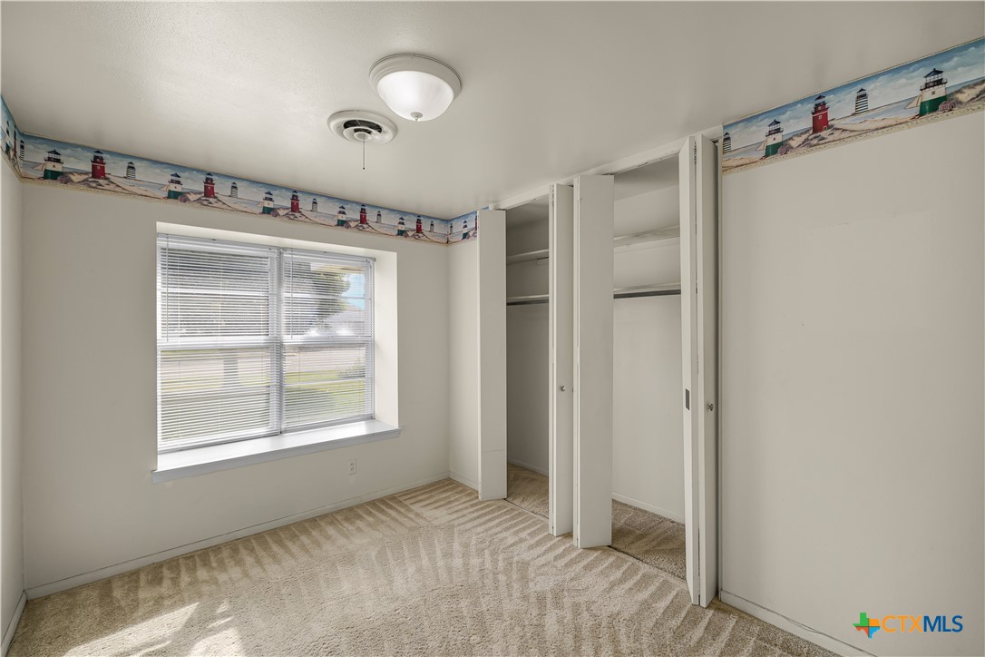3104 Erwin Avenue Victoria, TX 77901 - Photo 7 of 19 a view of an empty room with a window
