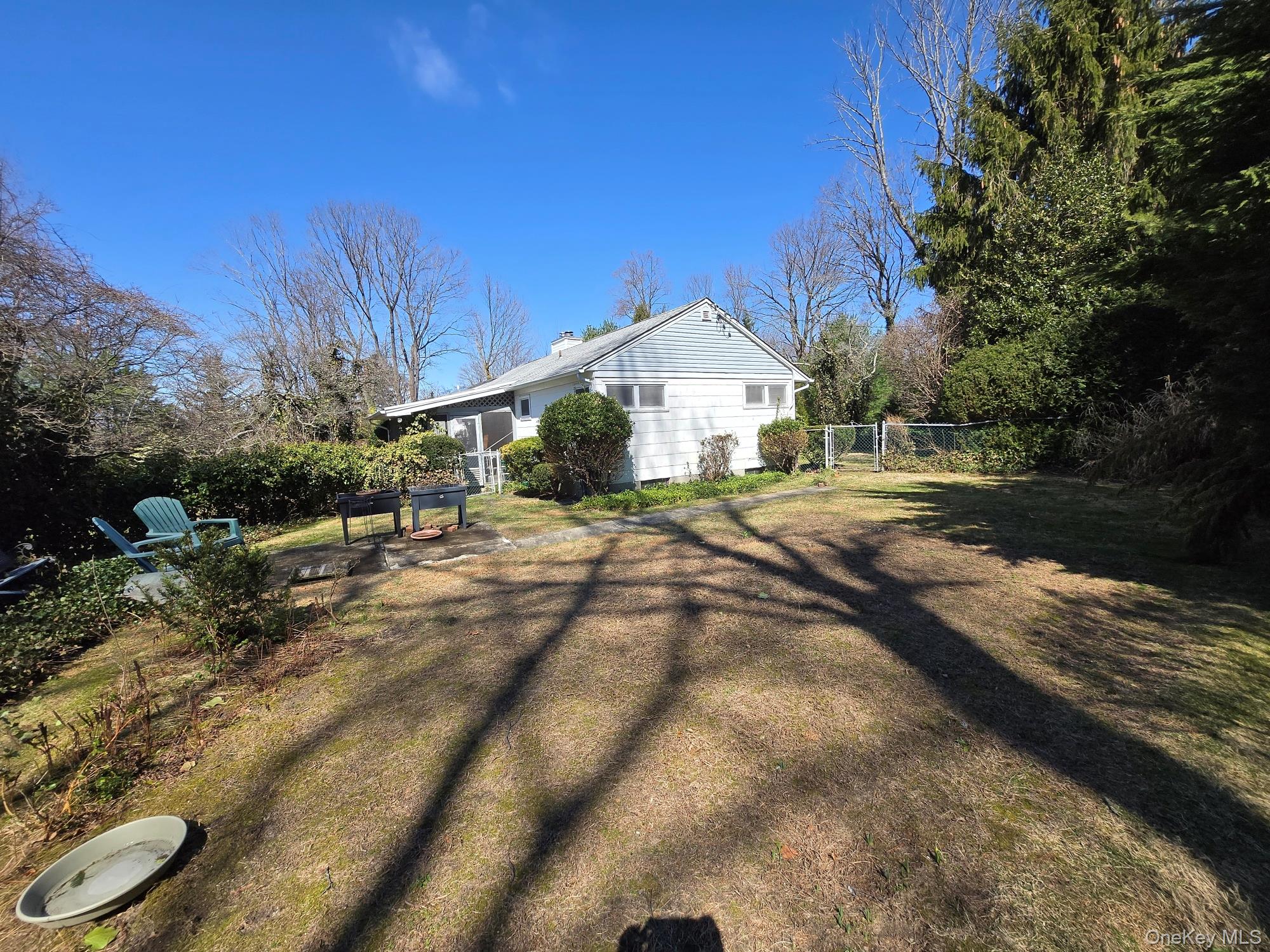 858 Fort Salonga Road Northport, NY 11768 - Photo 11 of 12 a view of a house with a yard