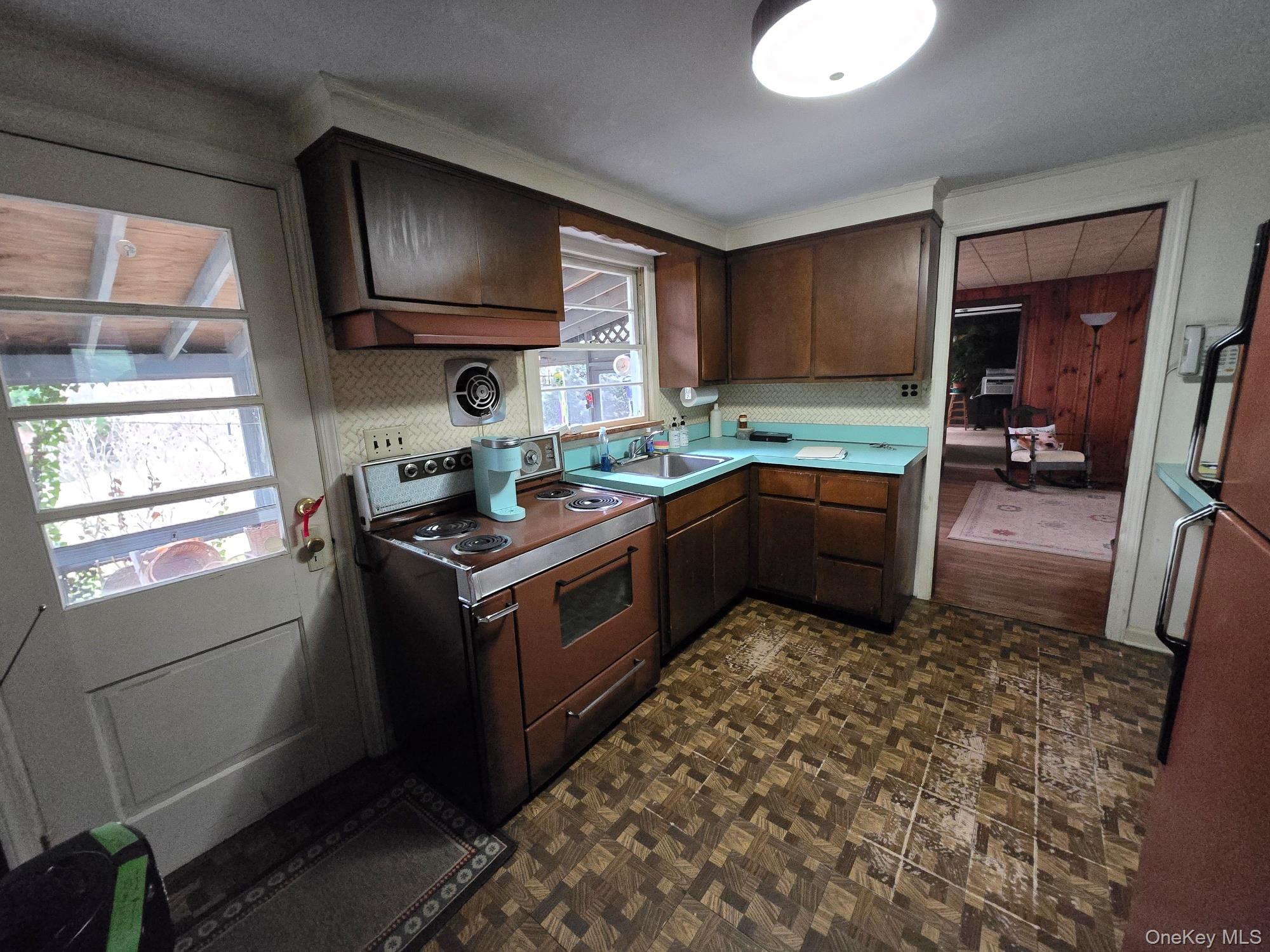 858 Fort Salonga Road Northport, NY 11768 - Photo 6 of 12 a kitchen with stainless steel appliances granite countertop a stove sink and cabinets