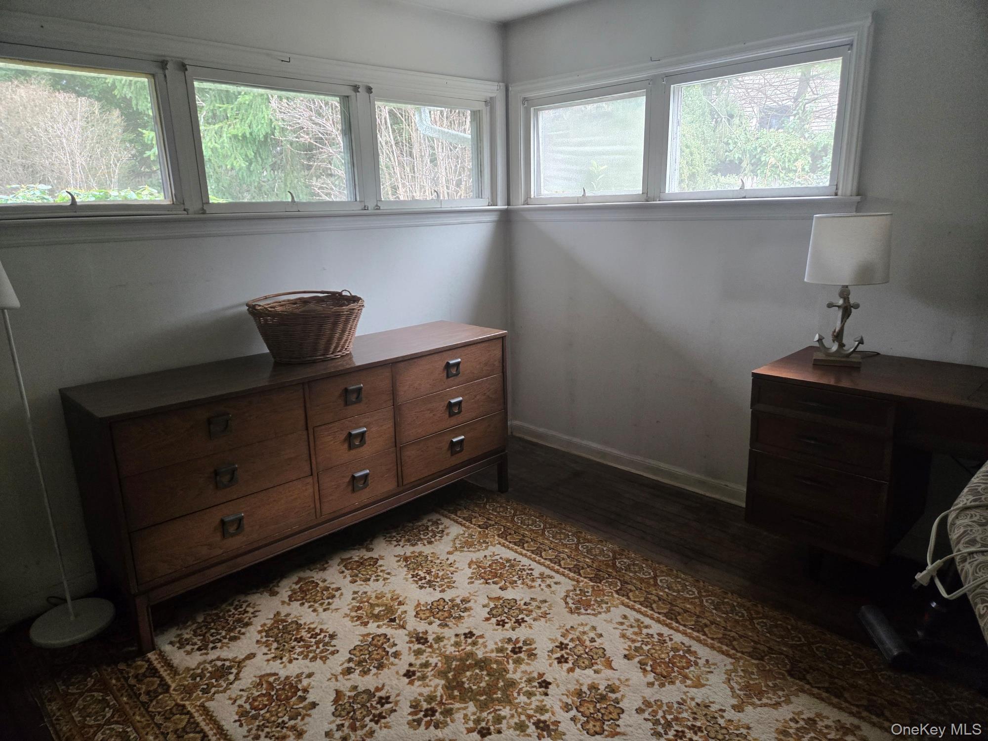 858 Fort Salonga Road Northport, NY 11768 - Photo 7 of 12 a room with furniture and windows