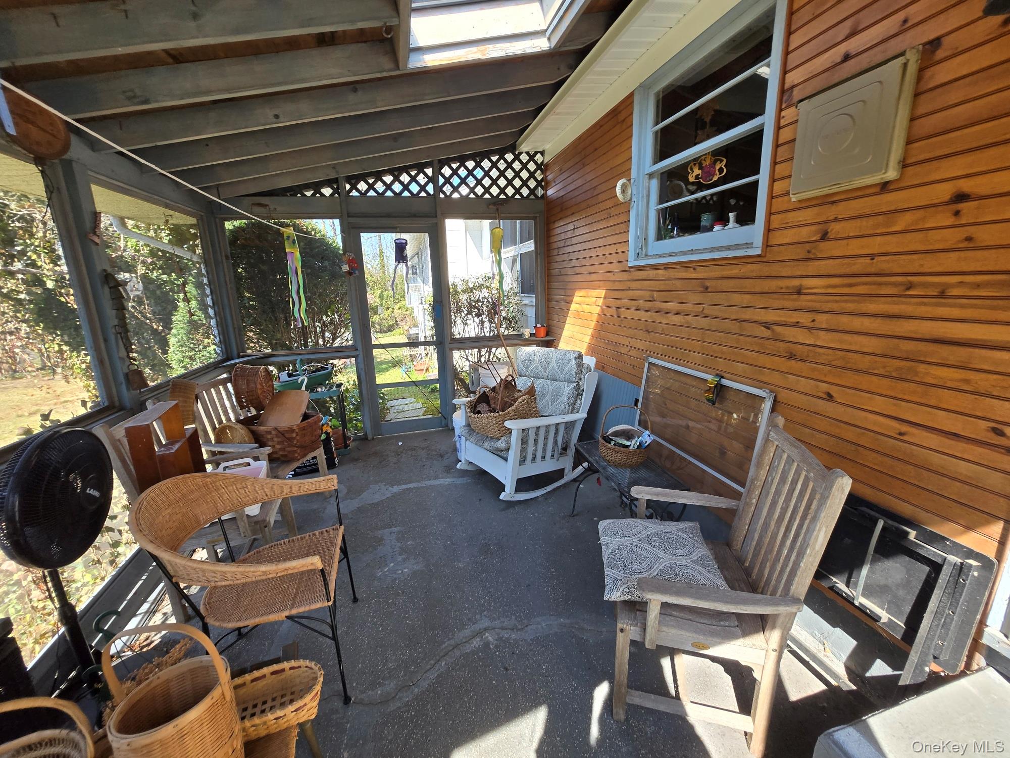 858 Fort Salonga Road Northport, NY 11768 - Photo 10 of 12 a building outdoor space with patio furniture