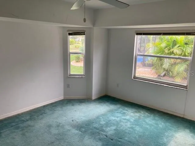 an empty room with windows