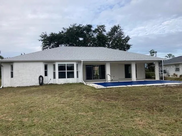 front view of a house with a garden