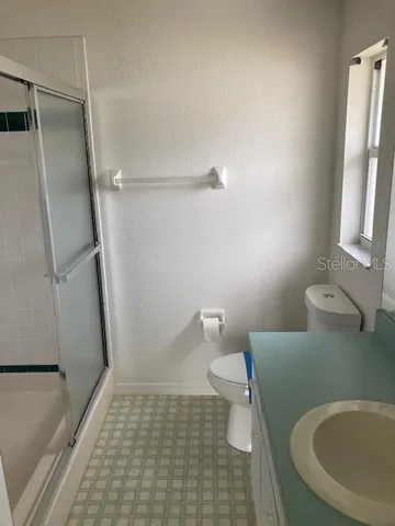 a bathroom with a sink and a toilet