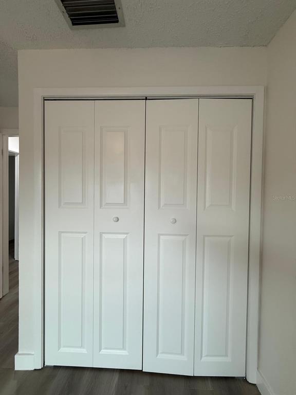 6125 Chesham Drive, Unit 1 New Port Richey, FL 34653 - Photo 34 of 39 a view of closet area