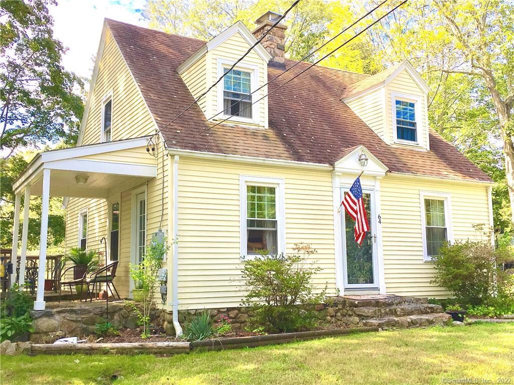 64 Old Colchester Road Waterford, CT 06375 - Photo 1 of 1 a front view of a house with a yard and swimming pool