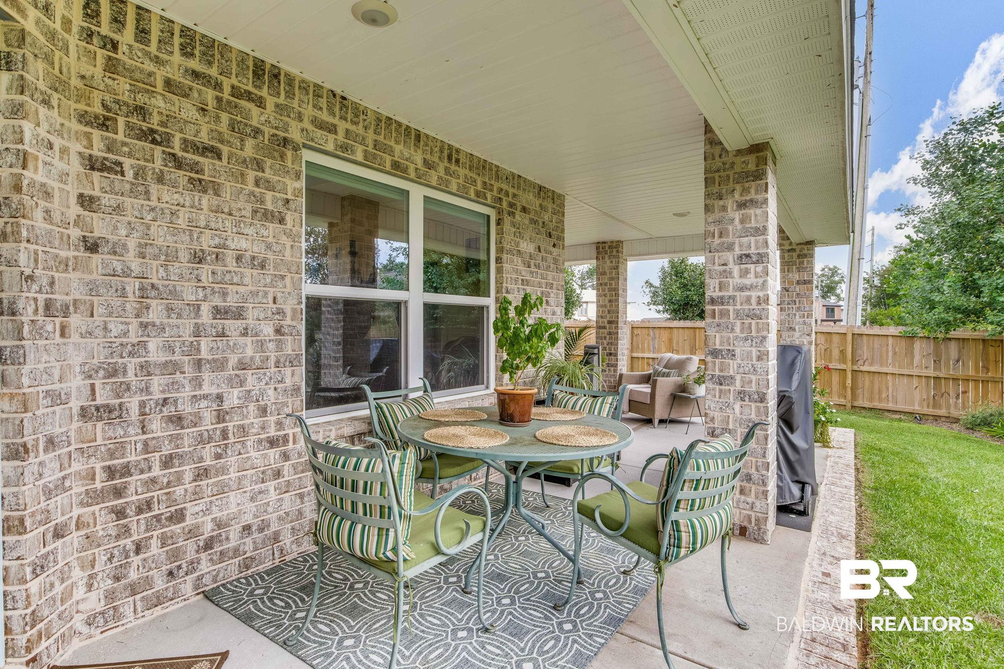 2222 Club House Drive Lillian, AL 36549 - Photo 24 of 49 View of patio / terrace featuring area for grilling