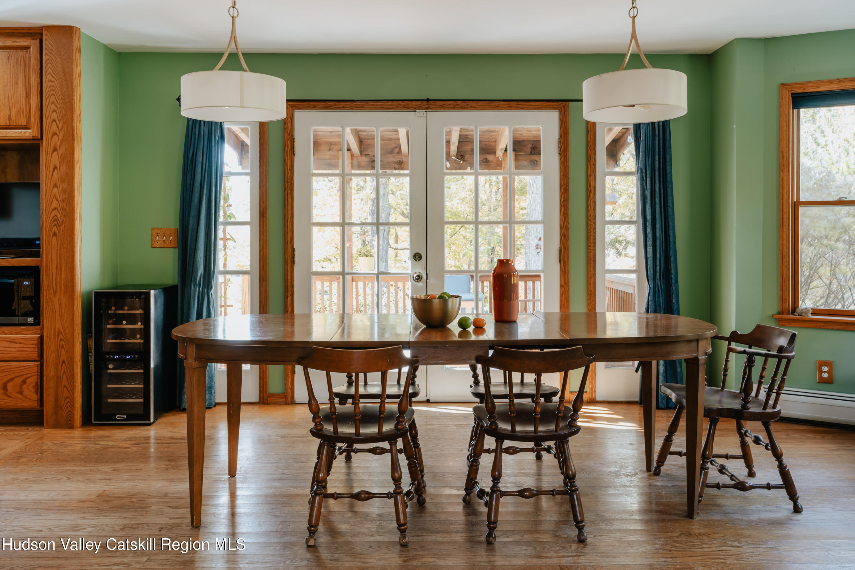 782-784 Jackson Corners Road Red Hook, NY 12571 - Photo 17 of 63 a dining room with furniture window and wooden floor
