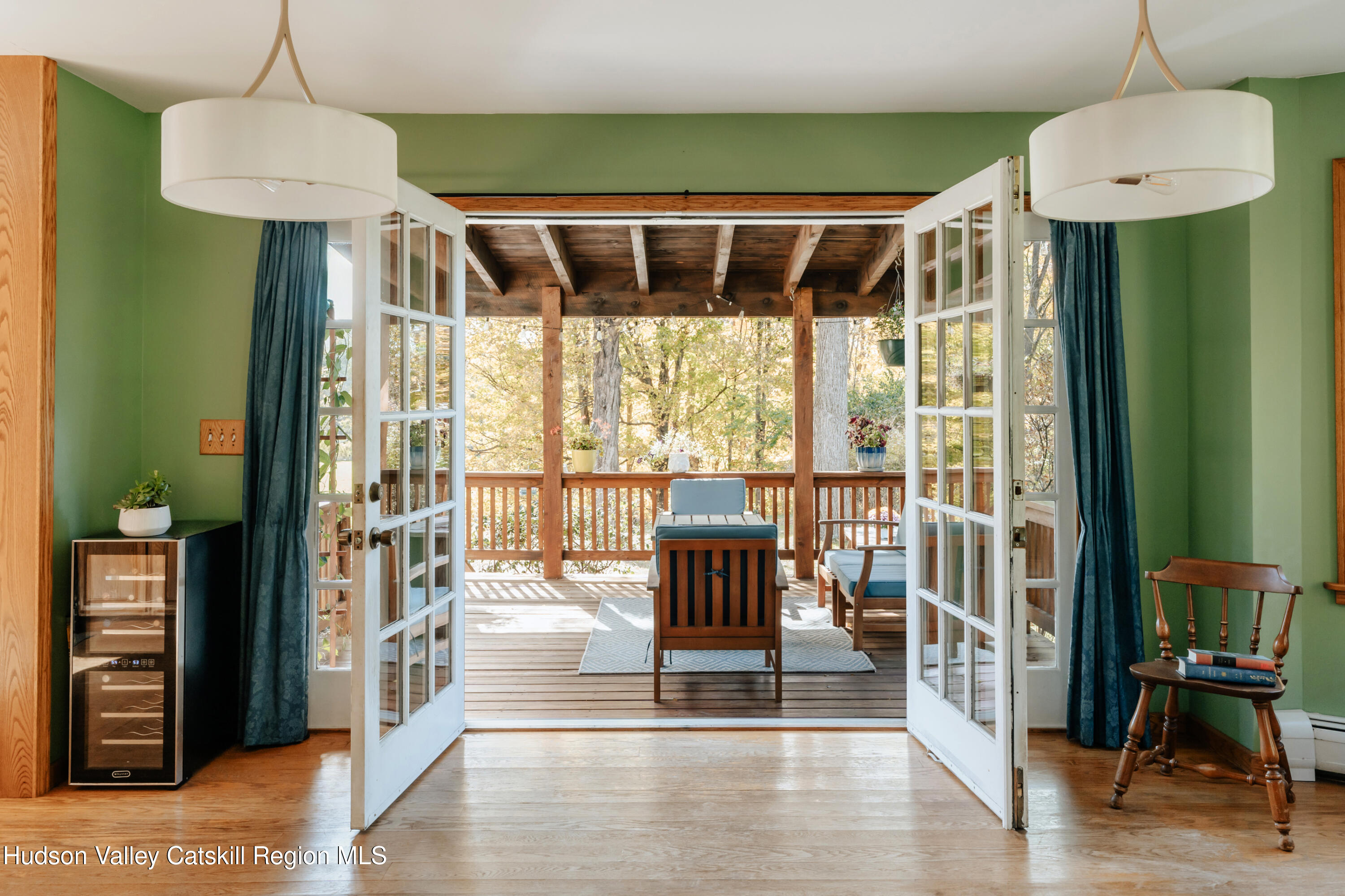 782-784 Jackson Corners Road Red Hook, NY 12571 - Photo 18 of 63 a view of a livingroom with wooden floor and furniture