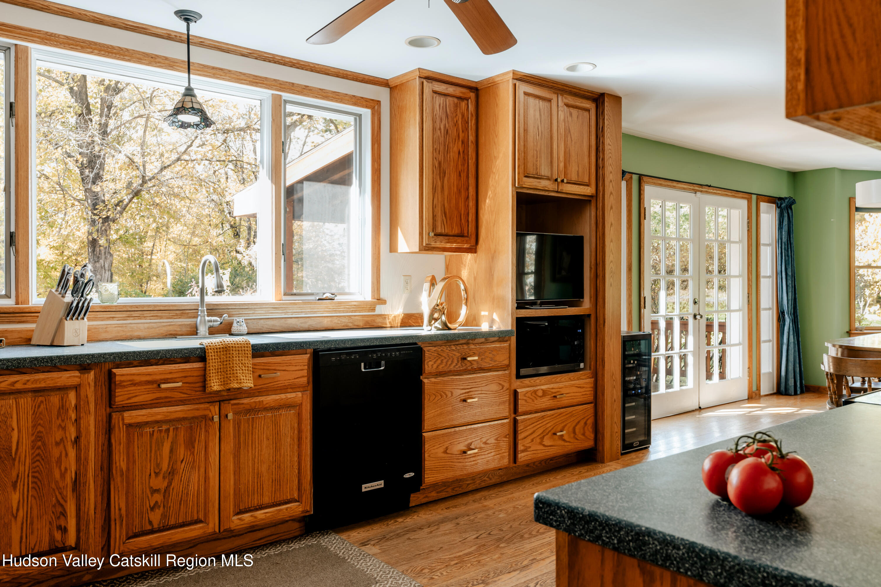 782-784 Jackson Corners Road Red Hook, NY 12571 - Photo 23 of 63 a kitchen with wooden cabinets and sink