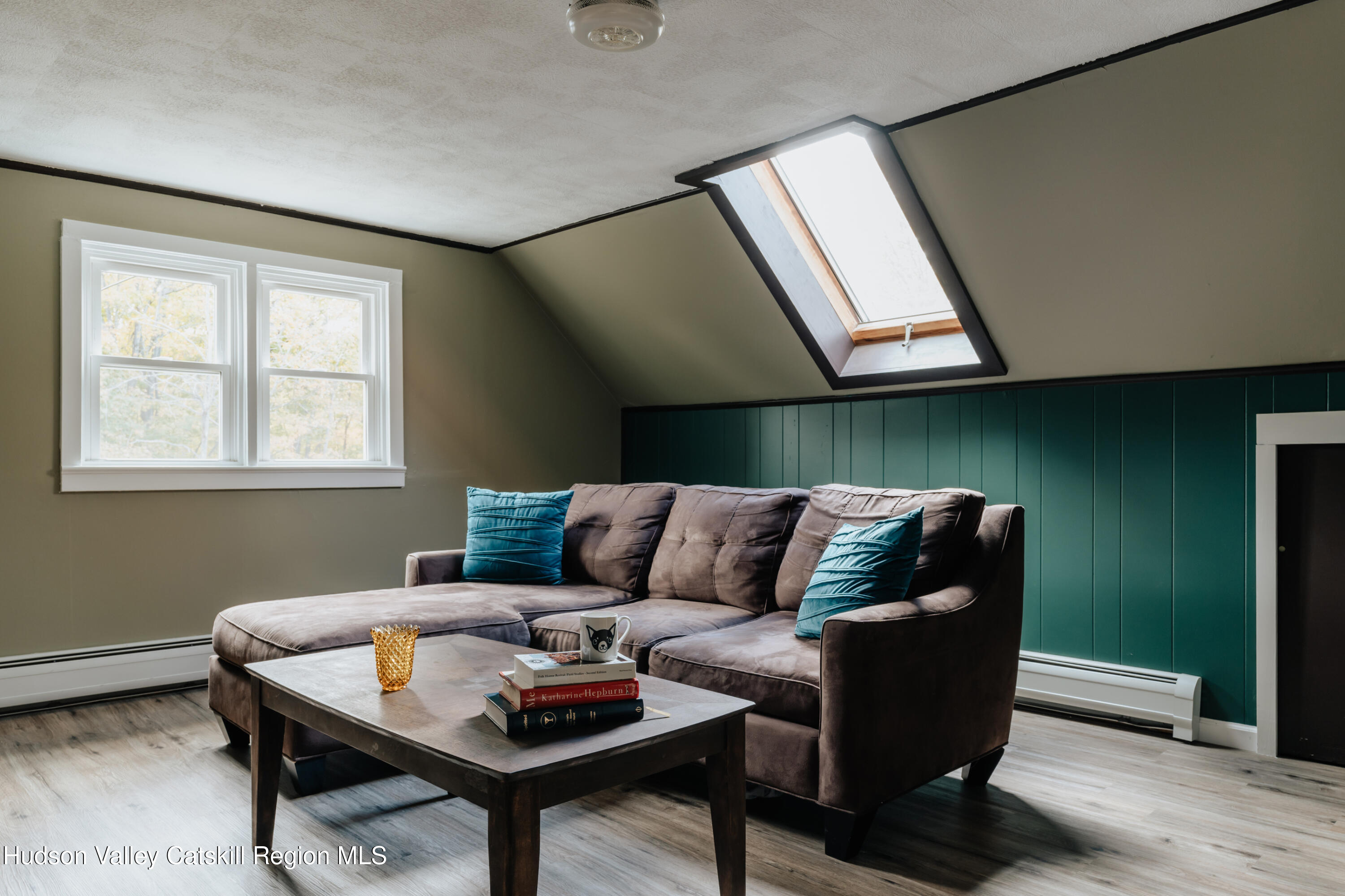 782-784 Jackson Corners Road Red Hook, NY 12571 - Photo 35 of 63 a living room with furniture and a window