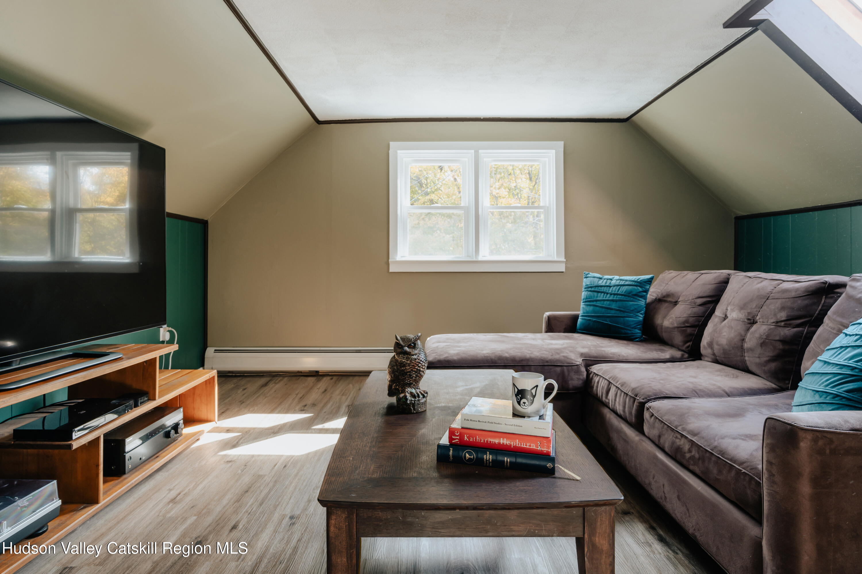 782-784 Jackson Corners Road Red Hook, NY 12571 - Photo 36 of 63 a living room with furniture and a flat screen tv