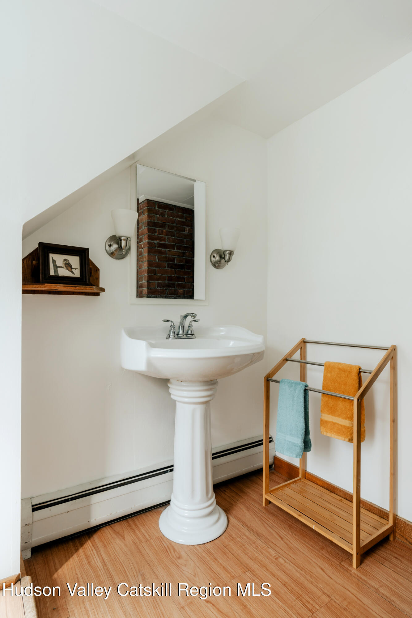 782-784 Jackson Corners Road Red Hook, NY 12571 - Photo 39 of 63 a bathroom with a sink and a mirror