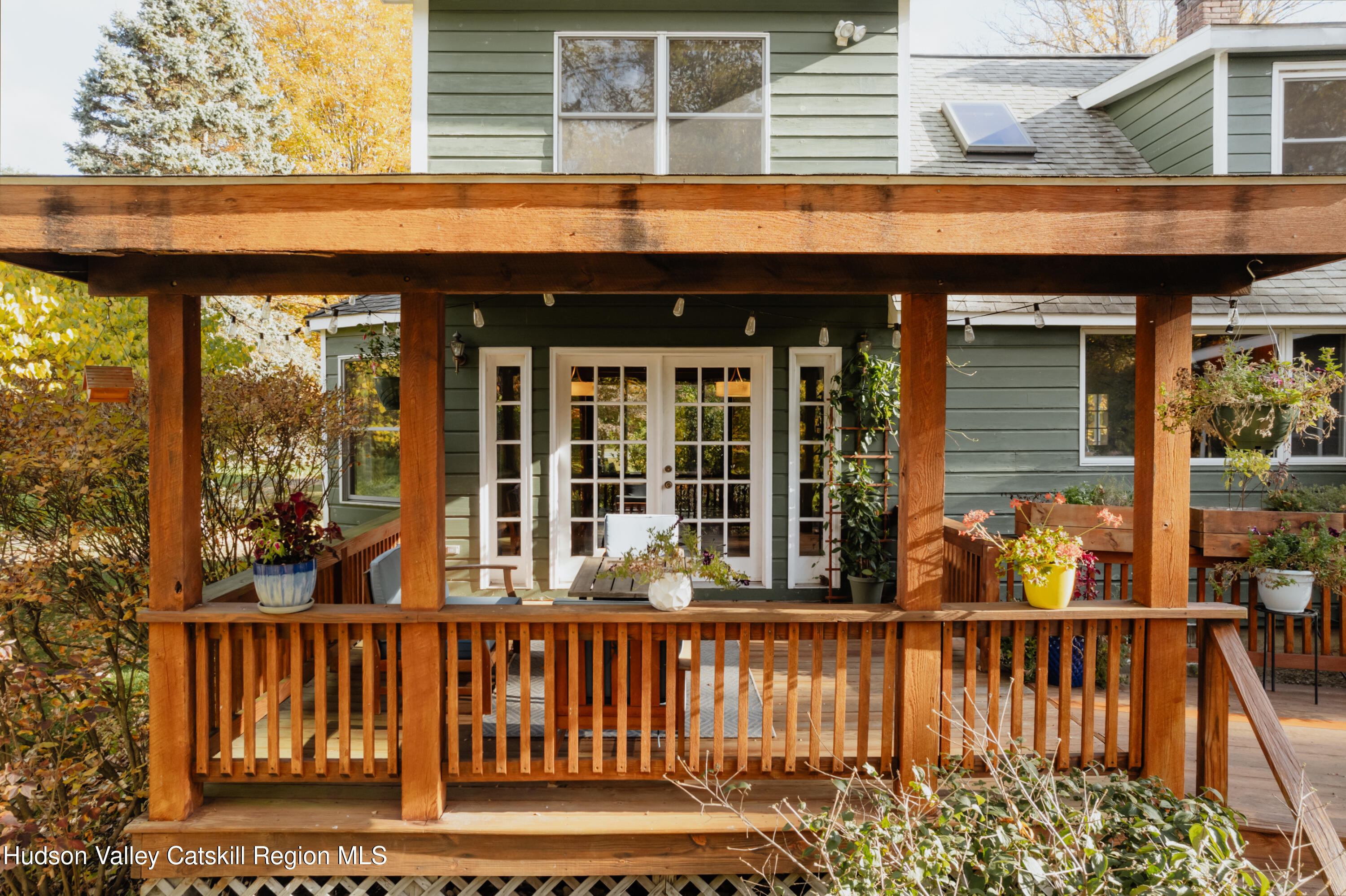 782-784 Jackson Corners Road Red Hook, NY 12571 - Photo 5 of 63 a view of a brick house with large windows