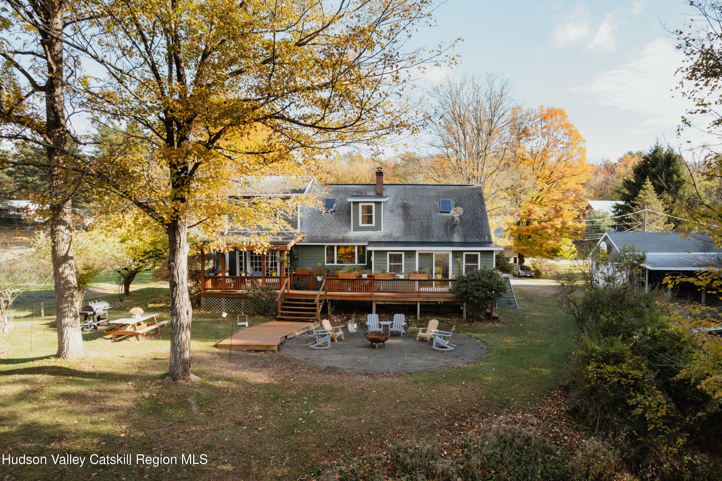 782-784 Jackson Corners Road Red Hook, NY 12571 - Photo 59 of 63 a view of a house with a yard and sitting area