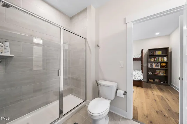 a bathroom with a sink vanity and mirror