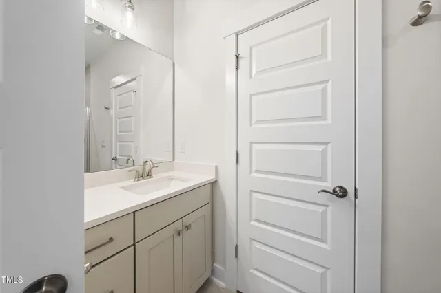 a building outdoor space with patio furniture and garden view