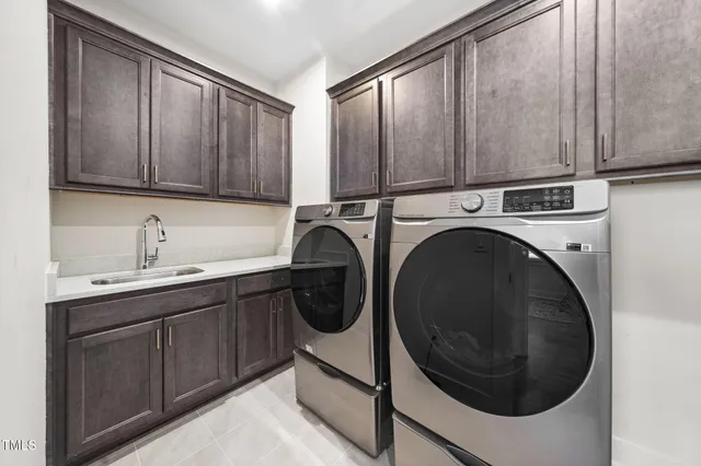 a building outdoor space with patio furniture and potted plants