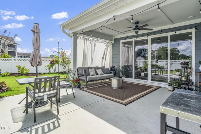 a view of a garden with a house