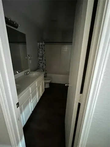 a bathroom with a sink and mirror