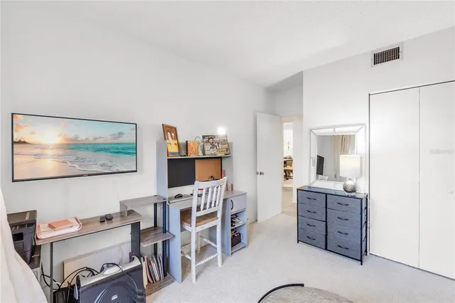 a bathroom with a tub and shower